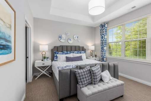 Carpeting In Bedrooms with wide windows at Encore at West Valley, White Lake, MI, Michigan