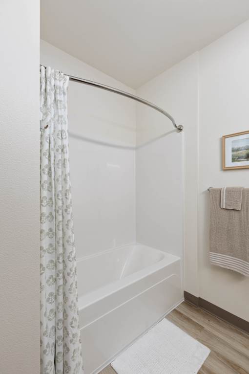Spacious bath tub curved curtain rod
