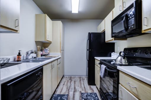 Fully Equipped Kitchen with microwave at Creston Point, Washington, 98178