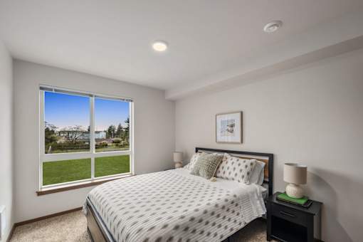 Guest bedroom inside a model apartment at Kendrick Landing Apartments