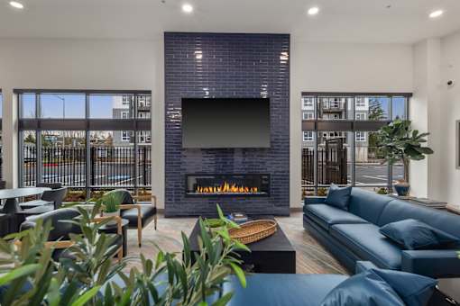 Resident lobby with fireplace at Kendrick Landing Apartments in Lakewood, WA