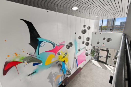 a wall with many different colors of paint on it
