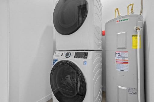 a washing machine and a refrigerator in a room