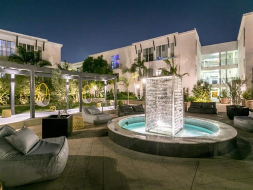 the pool and fountain at night
