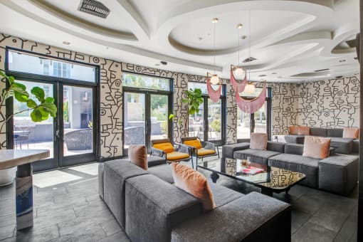 a living room with couches and a coffee table