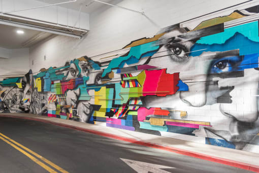 a mural of a face in a building