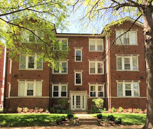 historic brick apartment complex quiet street