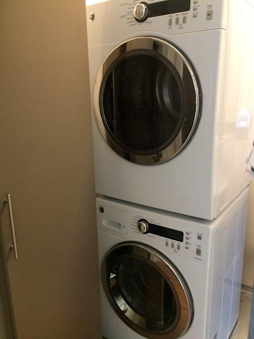 a washing machine and dryer in a laundry room