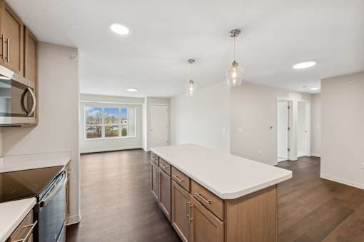 the preserve at ballantyne commons spacious kitchen with island and stainless steel appliances