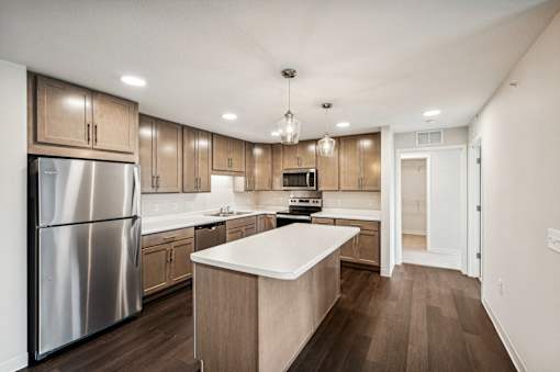 the preserve at ballantyne commons apartment kitchen with stainless steel appliances