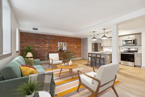 an open living room with a couch and a table