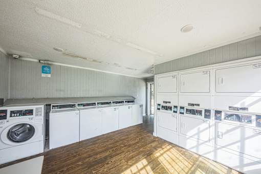 A laundry room with a washer and dryer.