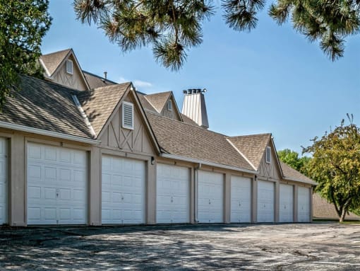 a white garage with a row of white garage doors