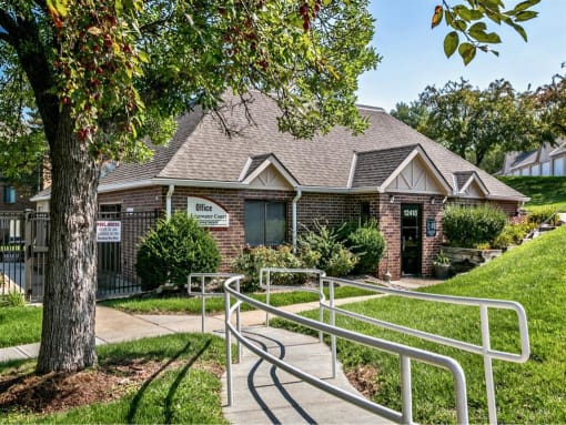 a house with a fence in front of it