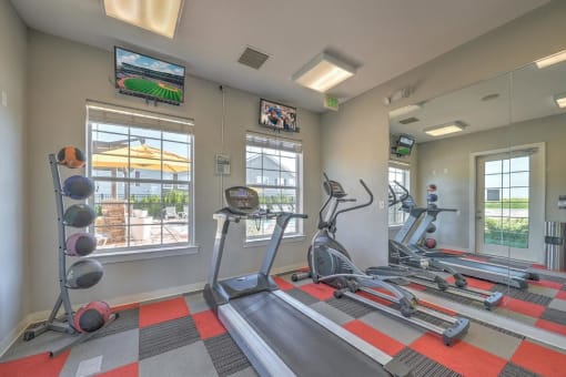 fitness room with exercise equipment