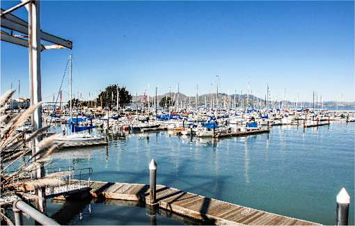 A marina with boats docked in the water.