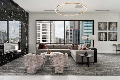 A modern living room with a view of the city.