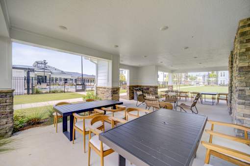 Outdoor dining area at The Enclave at Deer Moss Creek, Florida, 32578