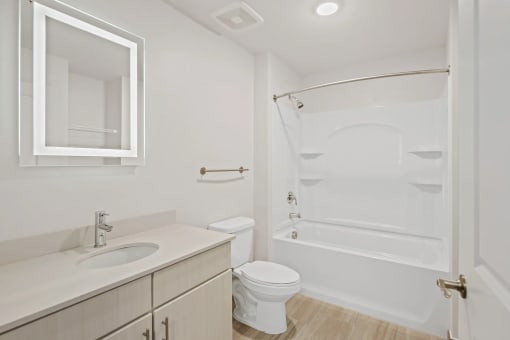 a bathroom with a sink toilet and a showerat Metropolis Apartments, Virginia, 23060