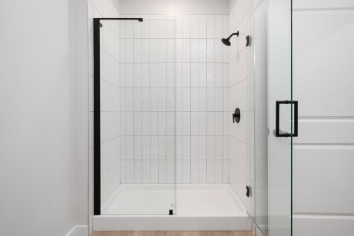 Walk-In Showers With Built-In Bench And Glass Enclosure at Crossline, Columbus, OH, 43201