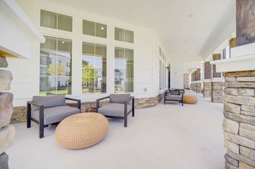 Patio with a couch at The Enclave at Deer Moss Creek, Niceville