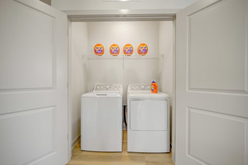 Two white washing machines at The Enclave at Deer Moss Creek, Florida, 32578