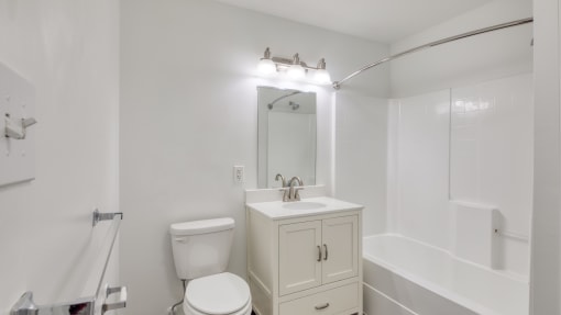 a bathroom with a bathtub and a sink at The Hudson, Richmond