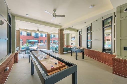 Game Room With Shuffle Board at The Lincoln Apartments, Raleigh