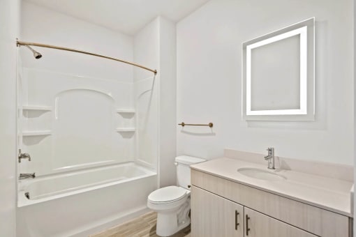 a bathroom with a sink toilet and a showerat Metropolis Apartments, Glen Allen, 23060