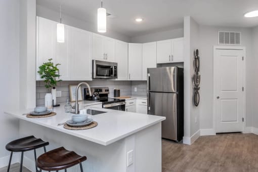 Kitchens designed to enhance your culinary experience and entertain effortlessly Centro at Pine Nash, Wilson, North Carolina