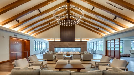 a large living room with couches and chairs and a fireplace at Ainsworth, Richmond, Virginia