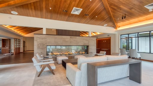 a living room with a fireplace and a table and chairs at Ainsworth, Virginia