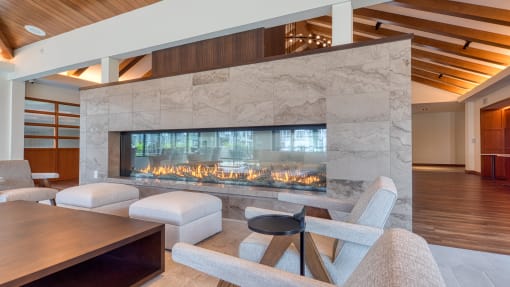 a living room with a fireplace and a table and chairs at Ainsworth, Virginia, 23228
