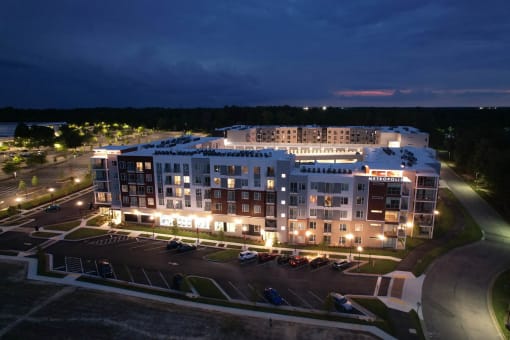 an aerial view of the hotel at nightat Metropolis Apartments, Virginia