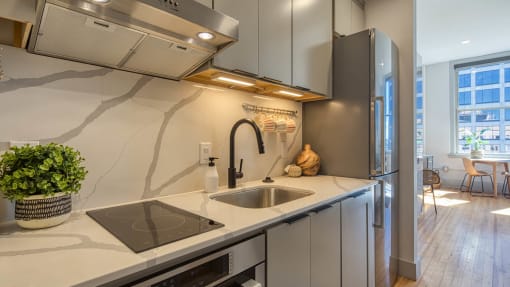 Stainless Steel Sink With Faucet In Kitchen at Residences at Richmond Trust, Virginia, 23219