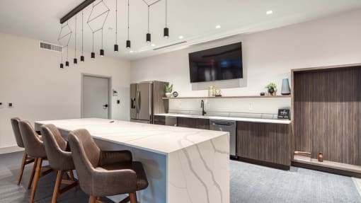 Eat-In Table With High Chairs In Clubhouse at Residences at Richmond Trust, Richmond
