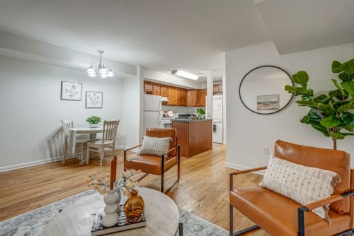 an open living room with a dining room and a kitchen
