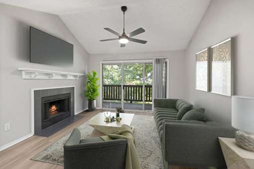 A modern living room with a fireplace and a flat screen TV mounted on the wall.
