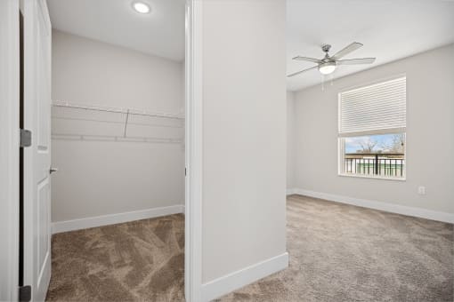 Enjoy ample closet and bedroom space, complete with a ceiling fan for ultimate comfort at Centro at Pine Nash, Wilson, 27893