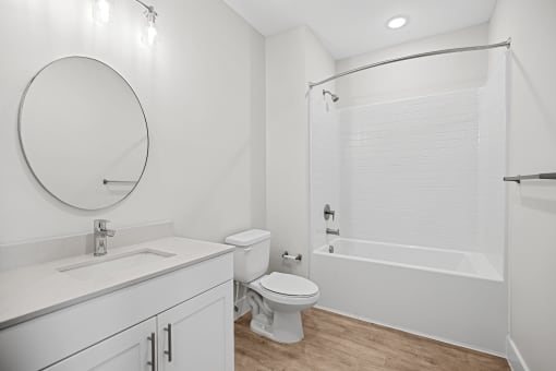 Modern designed bathroom interiors featuring custom vanity and bathtub option  Centro at Pine Nash, Wilson, NC