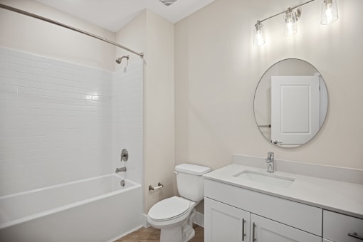 Featured A3 Floor Plan Bathroom Design featuring custom vanity and bathtub Centro at Pine Nash
