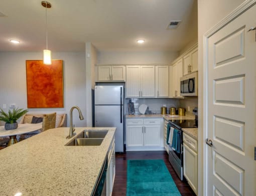 White Cabinetry And Appliances In Kitchen at Evolve at Tega Cay, Fort Mill, SC