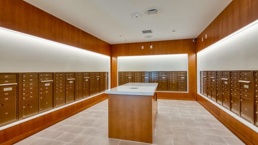 a locker room with wooden lockers and a counter in the middle at Ainsworth, Richmond