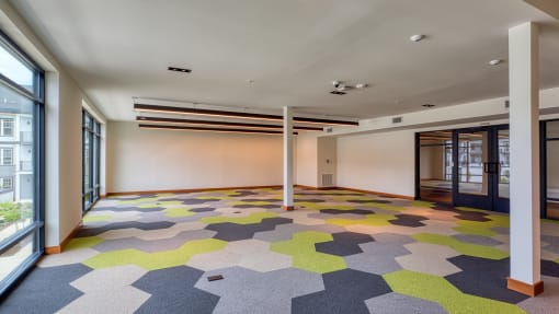 a large room with a colorful carpet in the middle of it at Ainsworth, Virginia