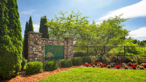 the sign at the entrance to the vineyards estate winery