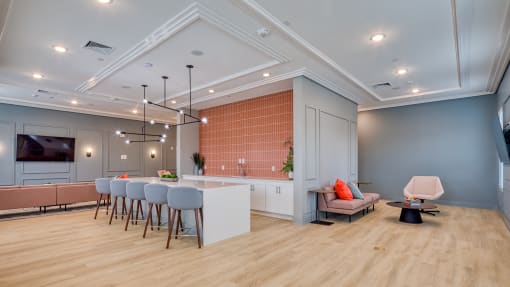 a living room with a kitchen and a dining room at The Bella at Westchester, Midlothian, VA, 23113