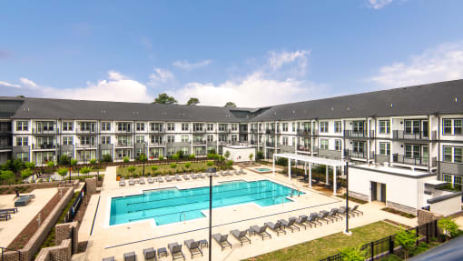 a large swimming pool in front of an apartment building at Ainsworth, Richmond, Virginia