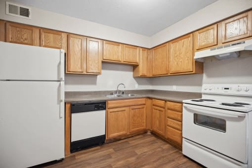 the preserve at ballantyne commons apartment kitchen with white appliances