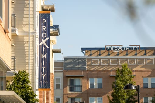 a view of a building with a sign for providence commons at Proximity at ODU in Norfolk, 23508