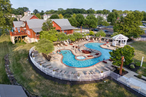 an aerial view of a swimming pool at a resort